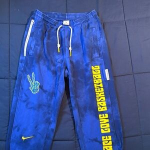Nike Youth Blue Joggers with Yellow Details